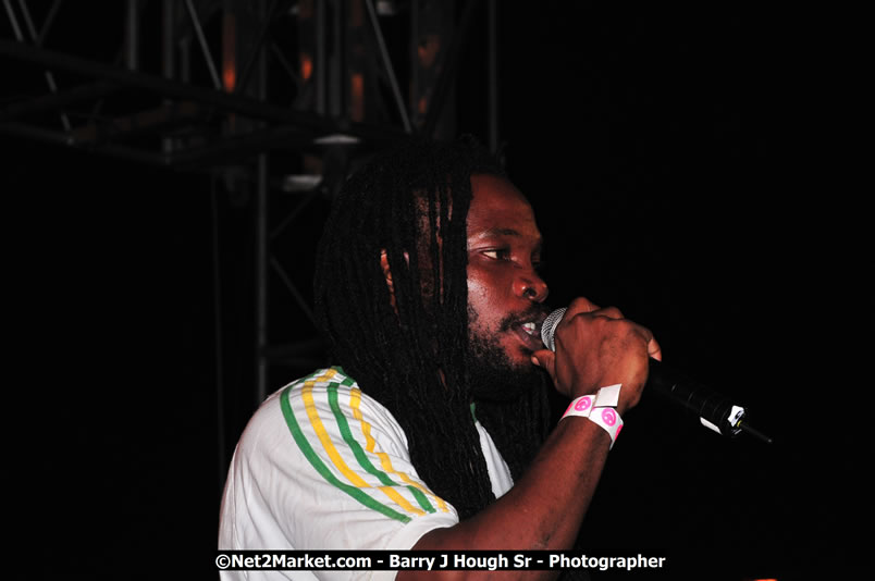 Lucea Cross the Harbour @ Lucea Car Park - All Day Event - Cross the Harbour Swim, Boat Rides, and Entertainment for the Family - Concert Featuring: Bushman, George Nooksl, Little Hero, Bushi One String, Dog Rice and many local Artists - Friday, August 1, 2008 - Lucea, Hanover Jamaica - Photographs by Net2Market.com - Barry J. Hough Sr. Photojournalist/Photograper - Photographs taken with a Nikon D300 - Negril Travel Guide, Negril Jamaica WI - http://www.negriltravelguide.com - info@negriltravelguide.com...!