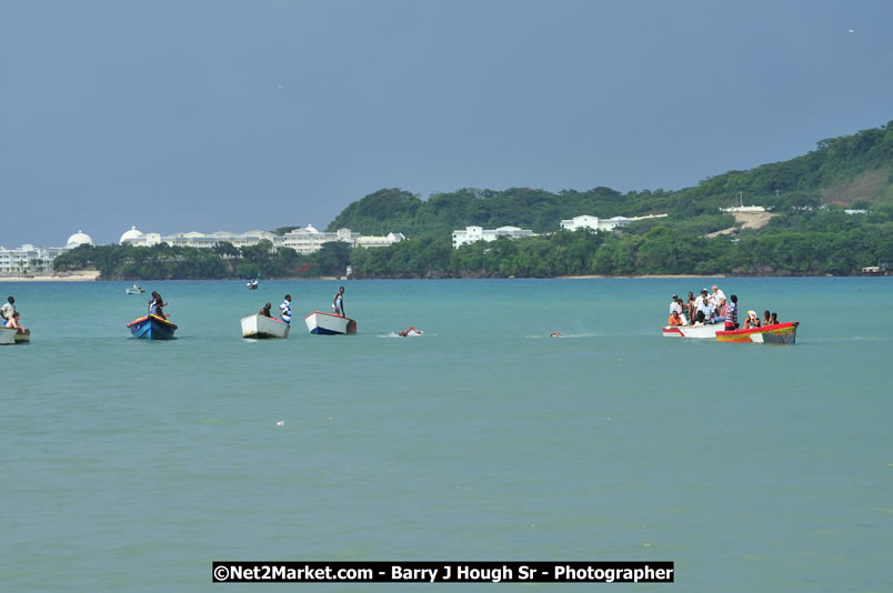 Lucea Cross the Harbour @ Lucea Car Park - All Day Event - Cross the Harbour Swim, Boat Rides, and Entertainment for the Family - Concert Featuring: Bushman, George Nooksl, Little Hero, Bushi One String, Dog Rice and many local Artists - Friday, August 1, 2008 - Lucea, Hanover Jamaica - Photographs by Net2Market.com - Barry J. Hough Sr. Photojournalist/Photograper - Photographs taken with a Nikon D300 - Negril Travel Guide, Negril Jamaica WI - http://www.negriltravelguide.com - info@negriltravelguide.com...!