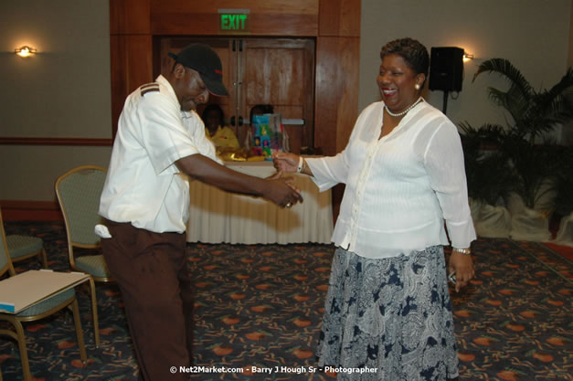 Red Cap Porters Awards - Minister of Tourism, Hon. Edmund Bartlett - Director of Tourism, Basil Smith - Friday, December 14, 2007 - Holiday Inn Sunspree, Montego Bay, Jamaica W.I. - Photographs by Net2Market.com - Barry J. Hough Sr, Photographer - Negril Travel Guide, Negril Jamaica WI - http://www.negriltravelguide.com - info@negriltravelguide.com...!